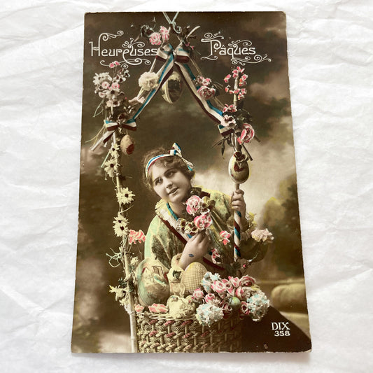 1920s - Vintage French Easter Postcard - Heureuses Pâques Greeting - Young Woman Floral Basket - Sepia Hand-Colored Photo Card