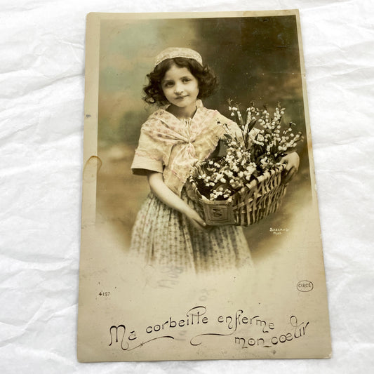 1910s - Antique French Postcard - Sepia Child Portrait with Lily of the Valley Basket - Sentimental Vintage Ephemera - Collectible Art
