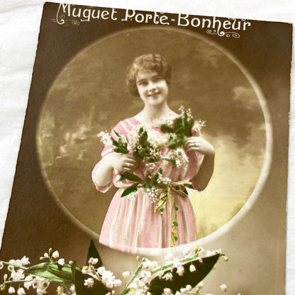 1910s - French Muguet Porte-Bonheur Postcard - Vintage Lily Of The Valley Lucky Charm - Smiling Woman Sepia Hand-Tinted - Collectible Floral