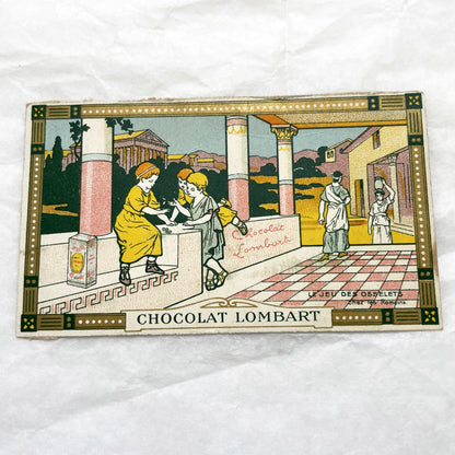 1900s - Vintage Chocolat Lombart Advertising Card - Ancient Roman Game Of Knucklebones - Antique French Chromo Card - Historical Scene