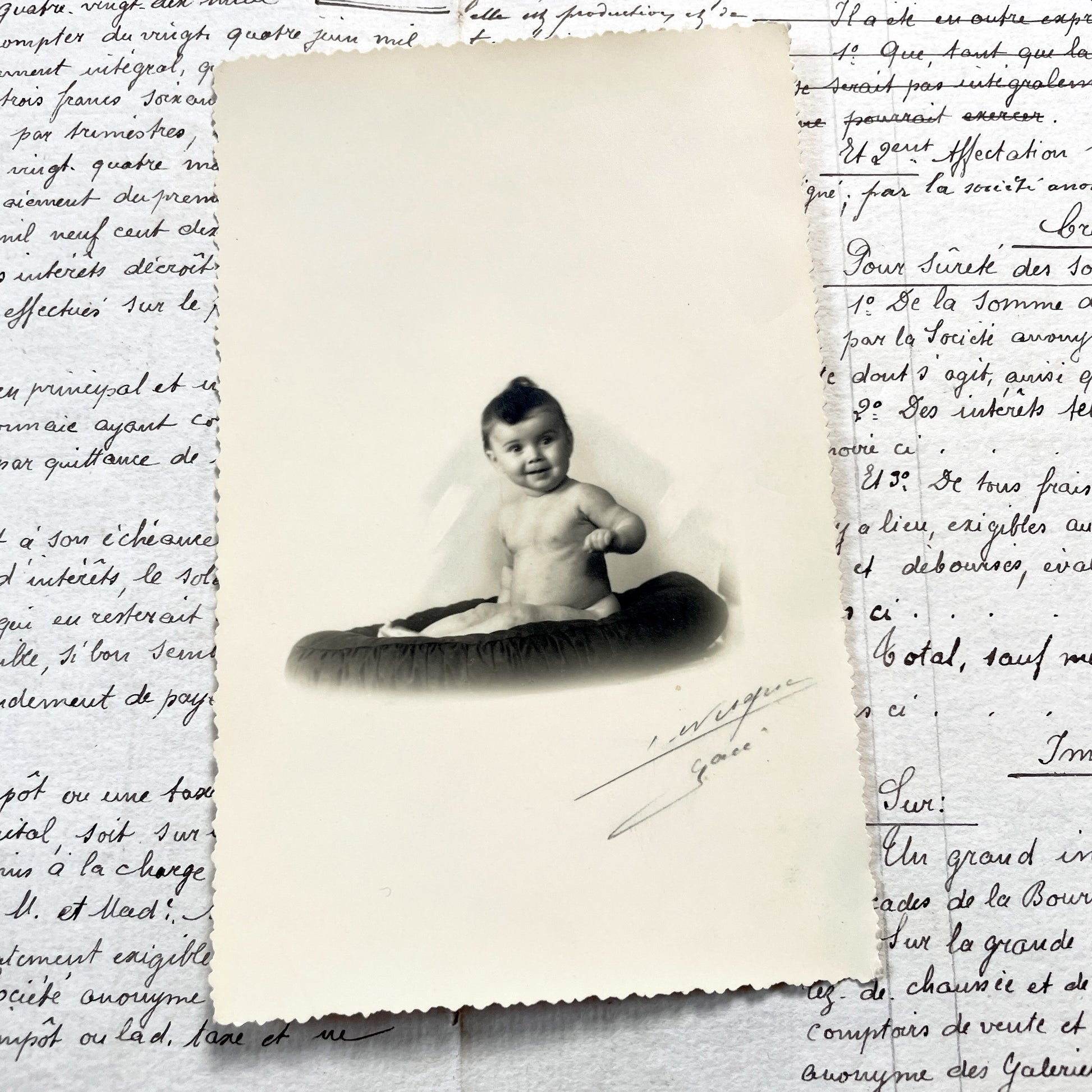 1900s - Vintage Black and White Baby Portrait - Charming Studio Photography - Adorable Infant on Cushion - Early 20th Century Childhood