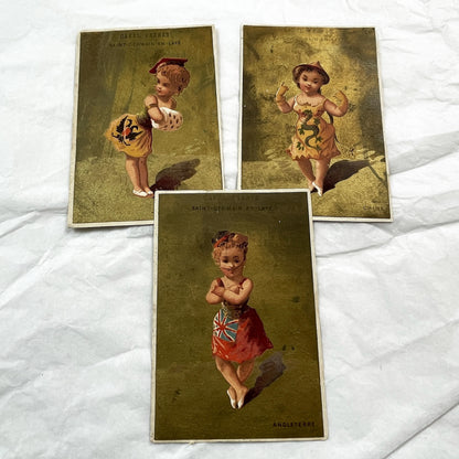 Late 19th - Set of Three Chocolatier Advertising Trade Cards - Antique French Chromolithographs - National Costume Children Set
