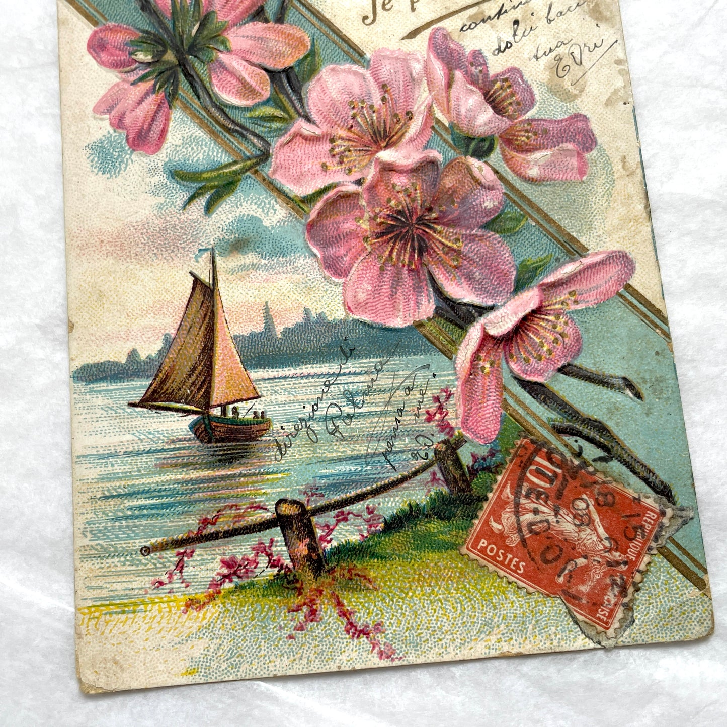 1900s French postcard with pink cherry blossoms, a sailboat, and a vintage French stamp