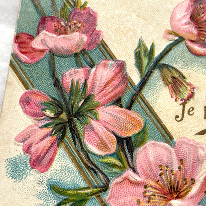 1900s French postcard with pink cherry blossoms, a sailboat, and a vintage French stamp
