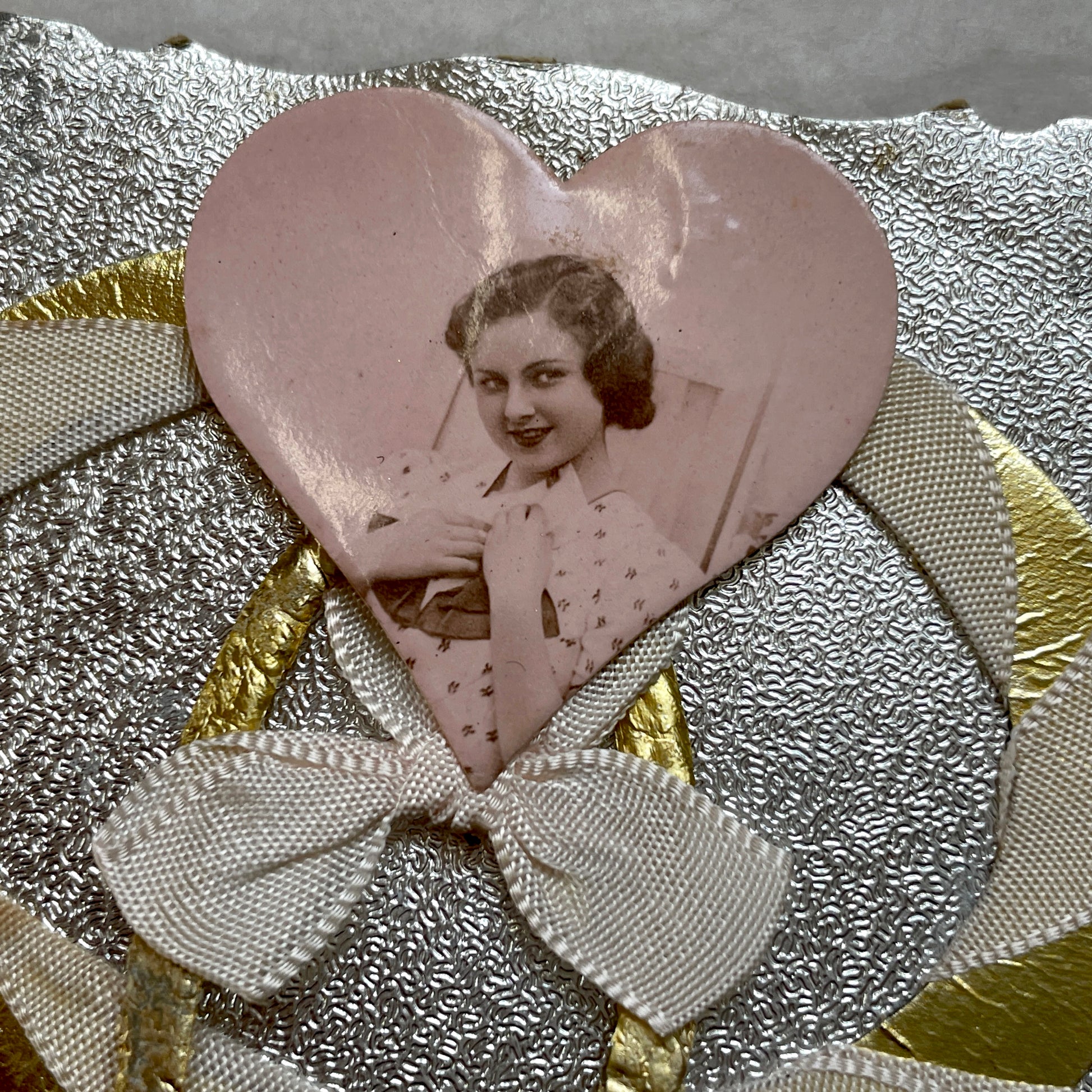 1930s Vintage Keepsake Card with heart-shaped photo, gold weave, and silver embossed background. Elegant decorative piece.