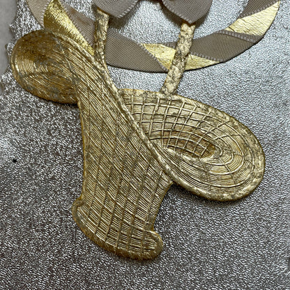 1930s Vintage Keepsake Card with heart-shaped photo, gold weave, and silver embossed background. Elegant decorative piece.