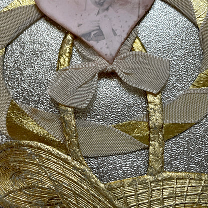 1930s Vintage Keepsake Card with heart-shaped photo, gold weave, and silver embossed background. Elegant decorative piece.