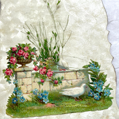 1900s Antique French greeting card with embossed doves, pink roses, blue forget-me-nots, and original postal stamp.