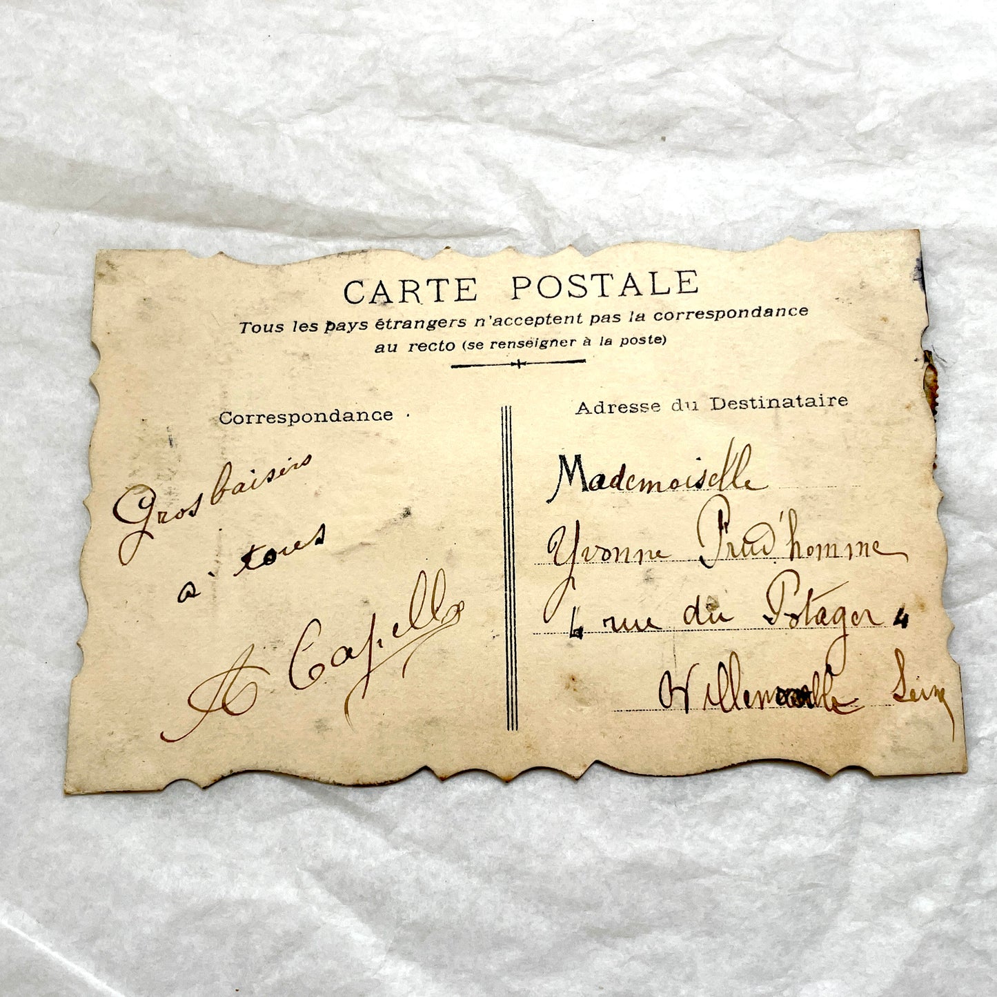 1900s Antique French greeting card with embossed doves, pink roses, blue forget-me-nots, and original postal stamp.