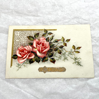 Lot of four vintage postcards from the 1940s featuring vibrant rose floral designs, some with French text and gold details.