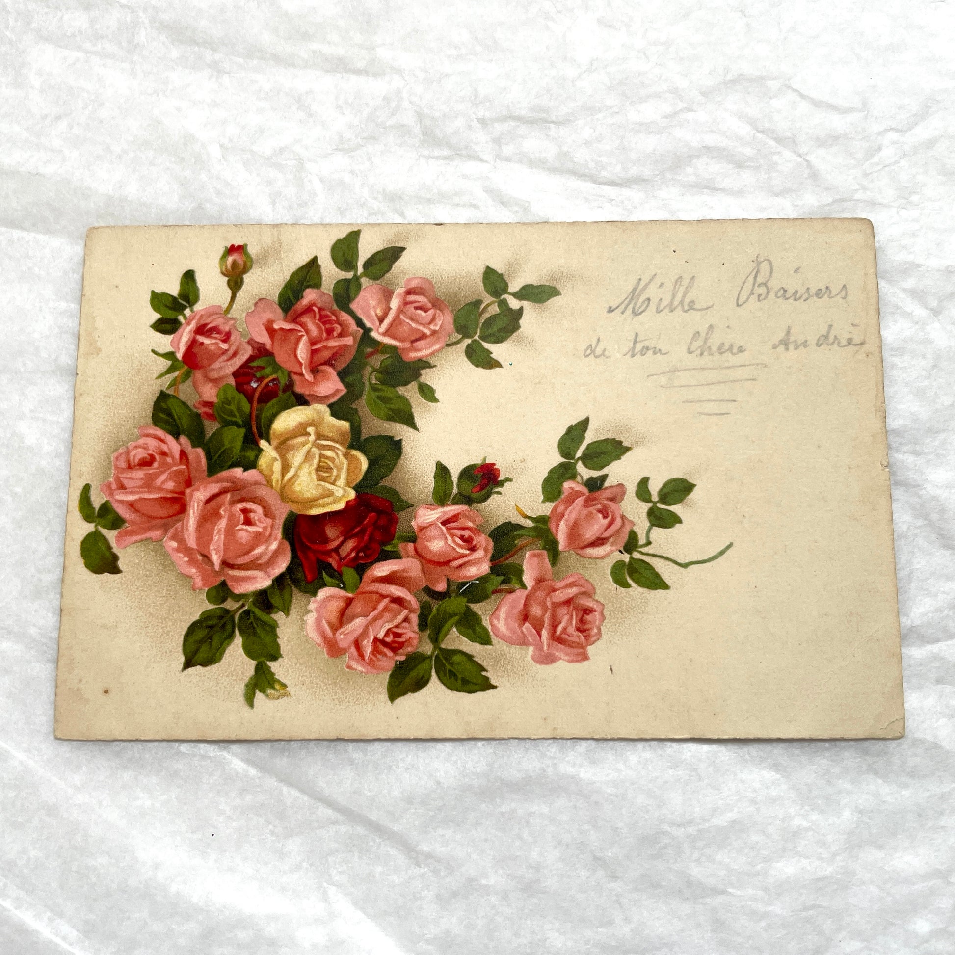 Lot of four vintage postcards from the 1940s featuring vibrant rose floral designs, some with French text and gold details.