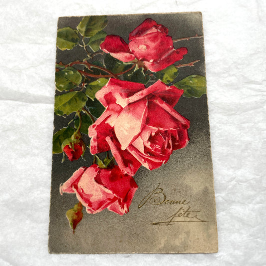 1930s lot of two antique French postcards with vibrant red and soft peach floral rose designs.