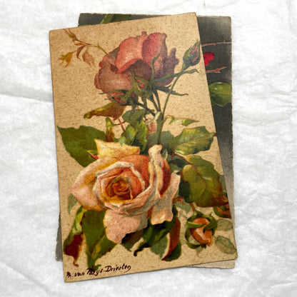 1930s lot of two antique French postcards with vibrant red and soft peach floral rose designs.