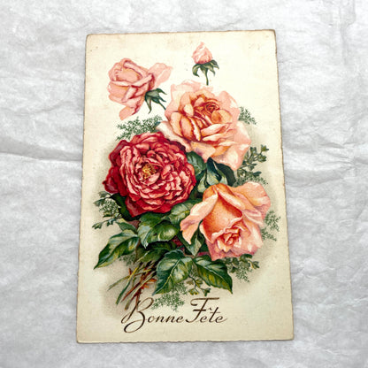 1910s French postcard lot with four antique floral rose greetings and celebratory French text, vintage ephemera.