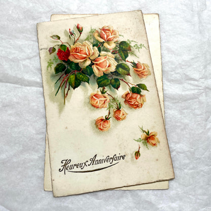 1910s French postcard lot with four antique floral rose greetings and celebratory French text, vintage ephemera.