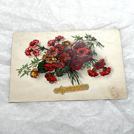 1900s French postcards lot with glitter floral designs and French text, vintage paper ephemera.