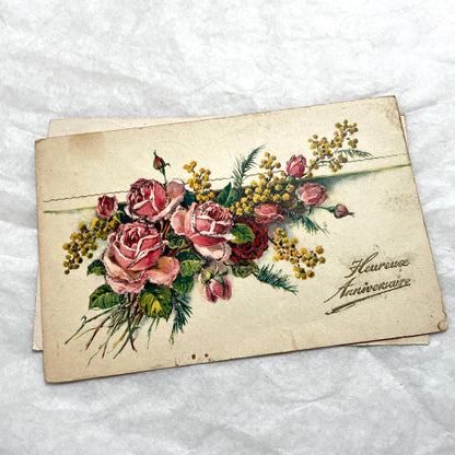 1900s French postcards lot with glitter floral designs and French text, vintage paper ephemera.