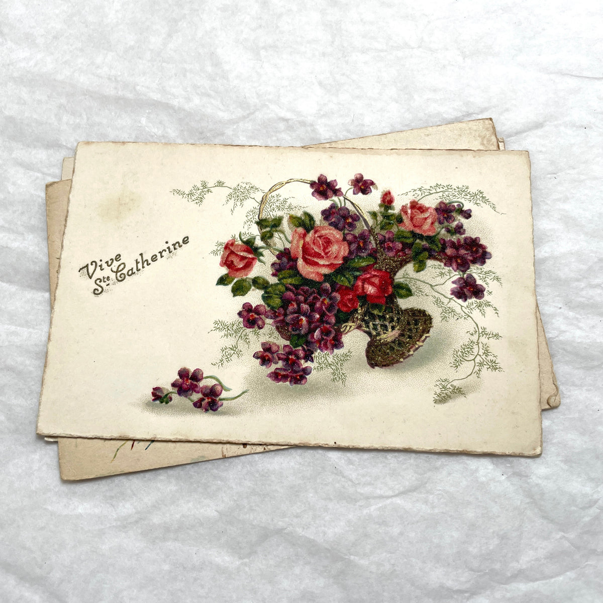 1900s French postcards lot with glitter floral designs and French text, vintage paper ephemera.