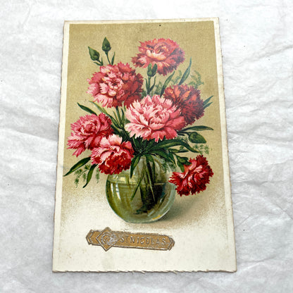 Lot of four 1950s carnation postcards featuring vibrant red and pink floral arrangements with French text.