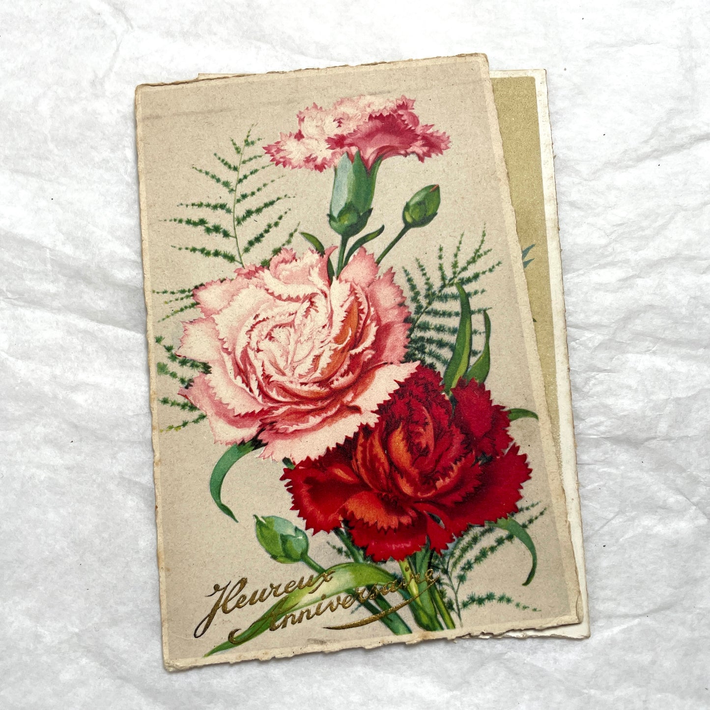 Lot of four 1950s carnation postcards featuring vibrant red and pink floral arrangements with French text.