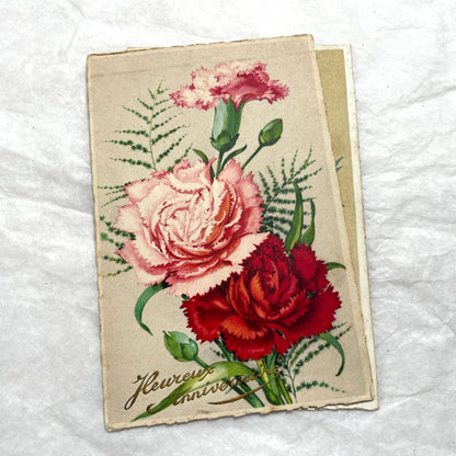 Lot of four 1950s carnation postcards featuring vibrant red and pink floral arrangements with French text.