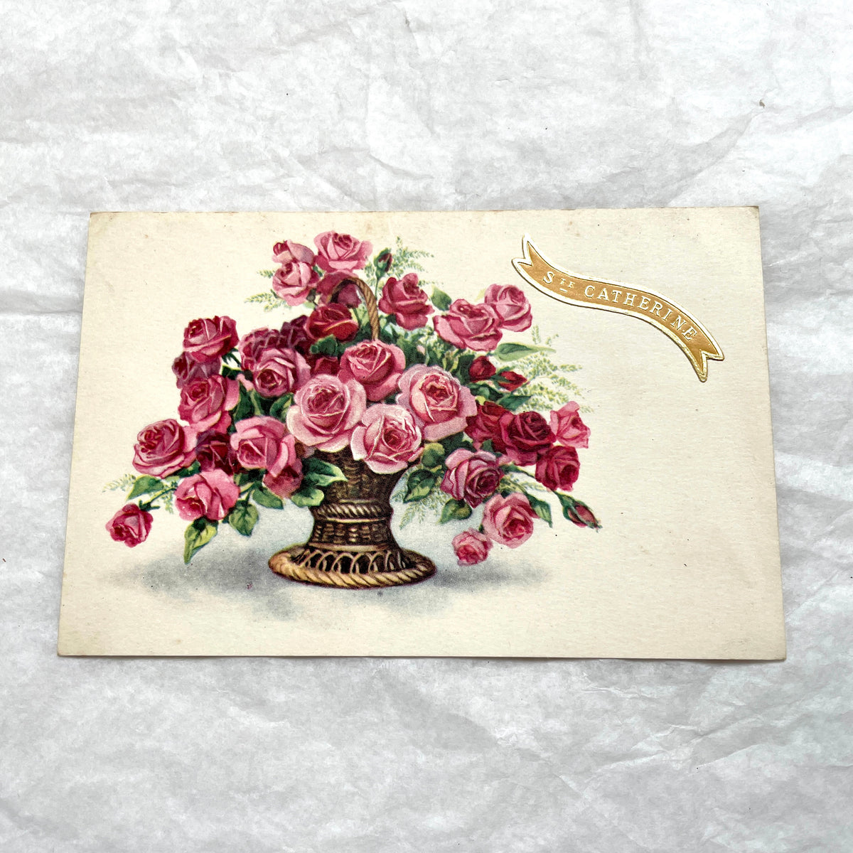 Four 1900s French vintage postcards with beautiful pink and red rose floral designs and 'St Catherine' banners.