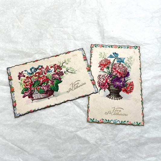 1950s French decorative card lot with floral baskets, glitter accents, and 'Vive Ste Catherine' inscription.