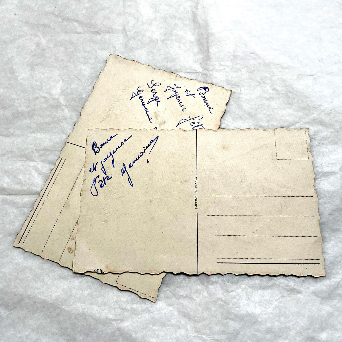 1950s French decorative card lot with floral baskets, glitter accents, and 'Vive Ste Catherine' inscription.