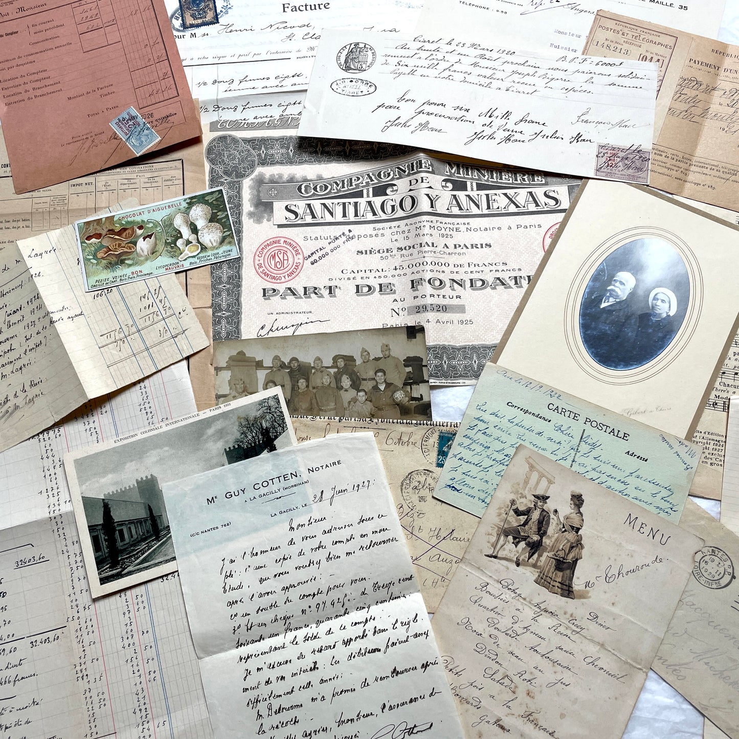 1920s French Ephemera Lot with vintage paper documents, old letters, invoices, postcards, photos, and stamps.