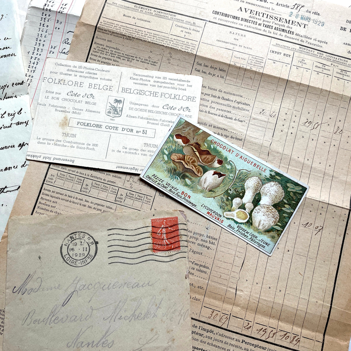 1920s French Ephemera Lot with vintage paper documents, old letters, invoices, postcards, photos, and stamps.