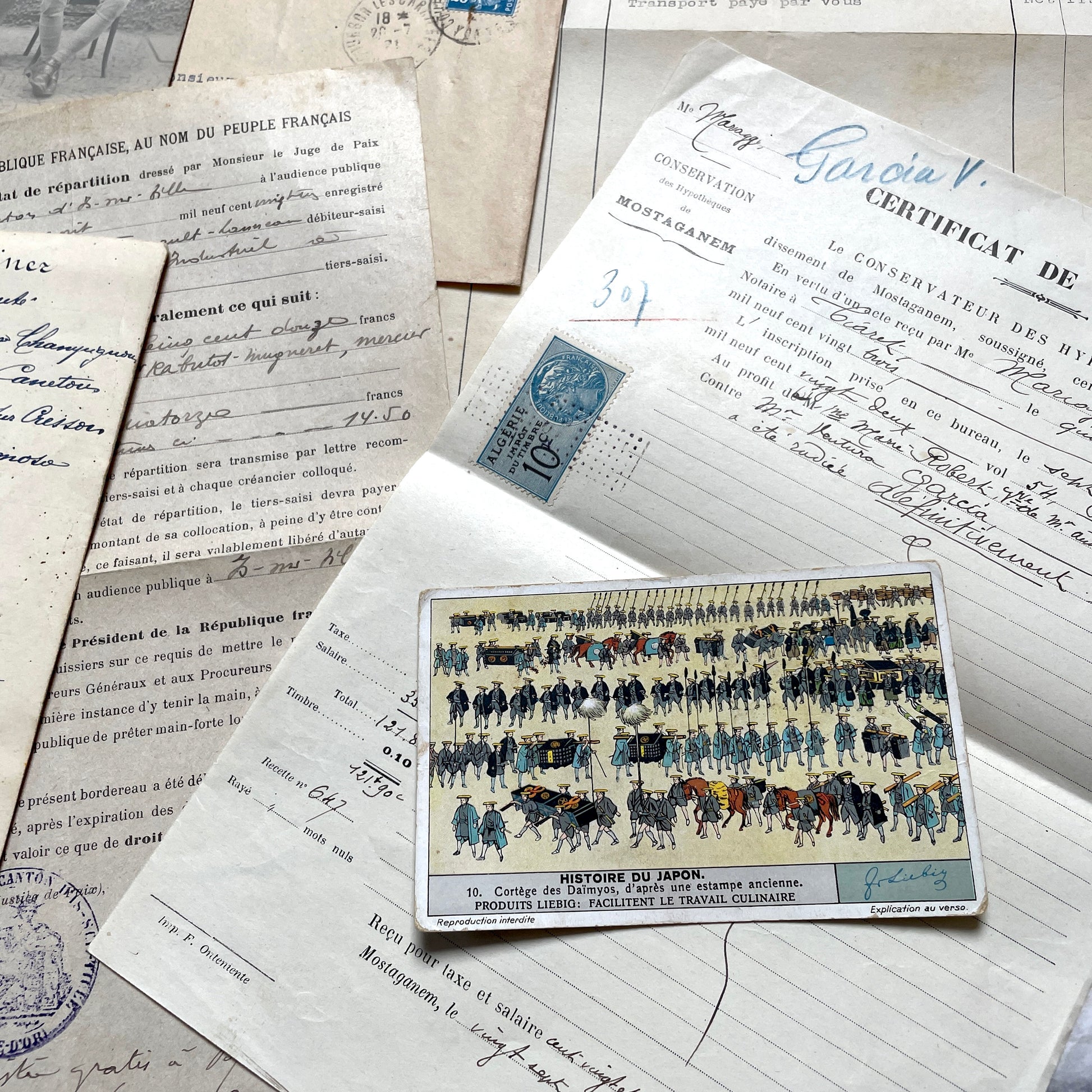 1920s French documents lot with vintage letters, receipts, menu, postcard, and stock certificate, all paper ephemera.