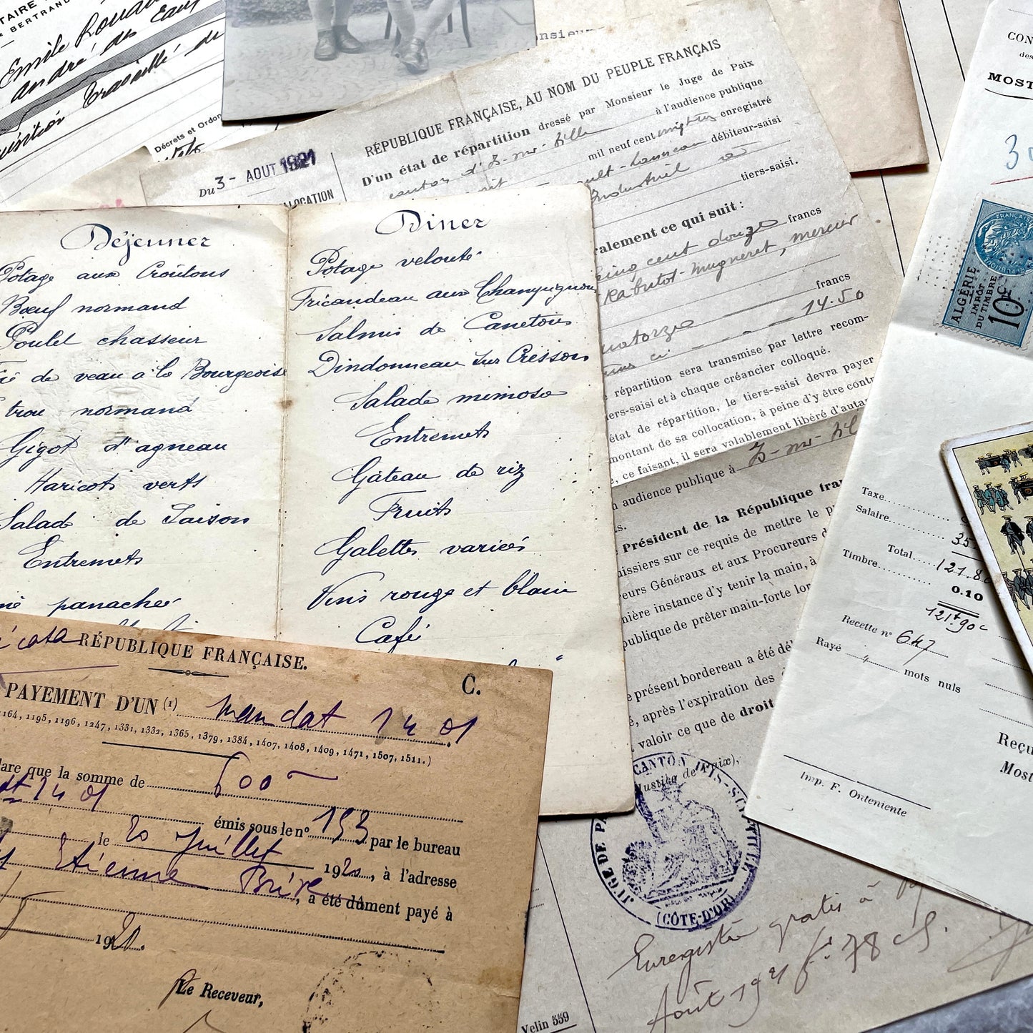1920s French documents lot with vintage letters, receipts, menu, postcard, and stock certificate, all paper ephemera.