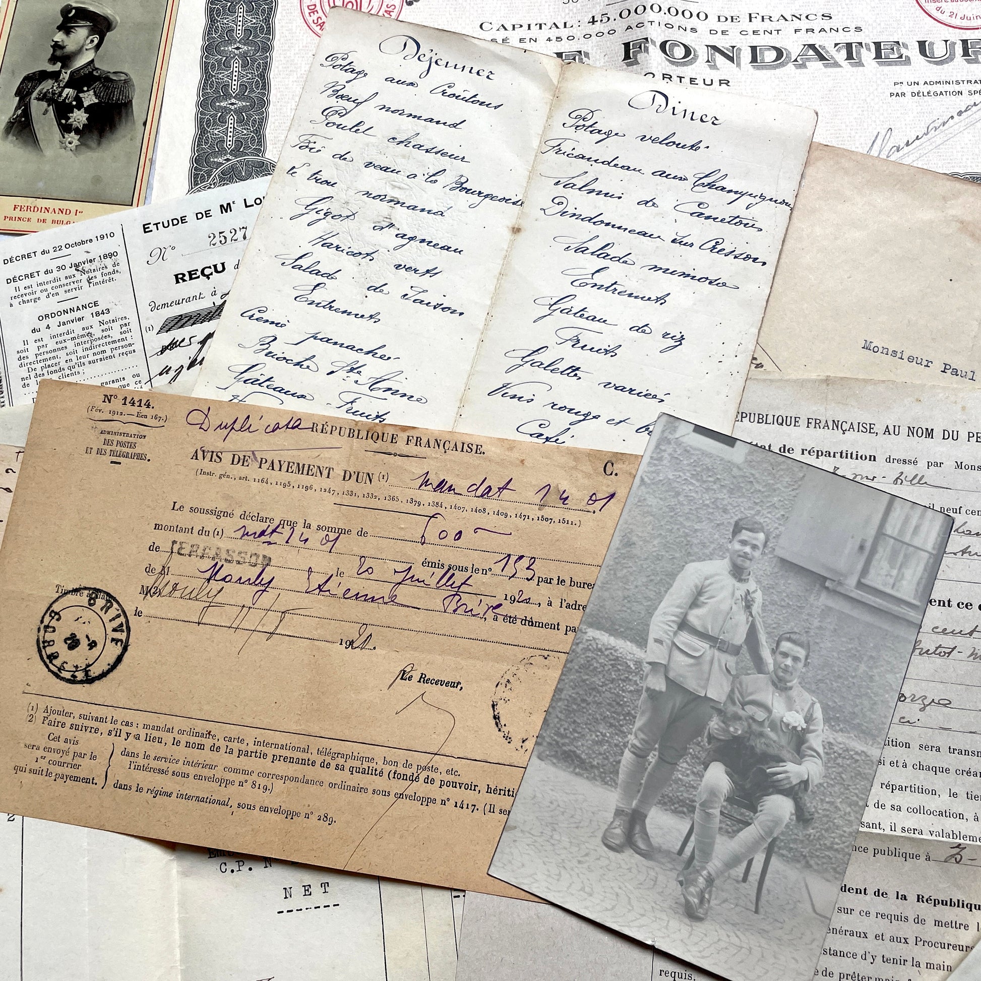 1920s French documents lot with vintage letters, receipts, menu, postcard, and stock certificate, all paper ephemera.