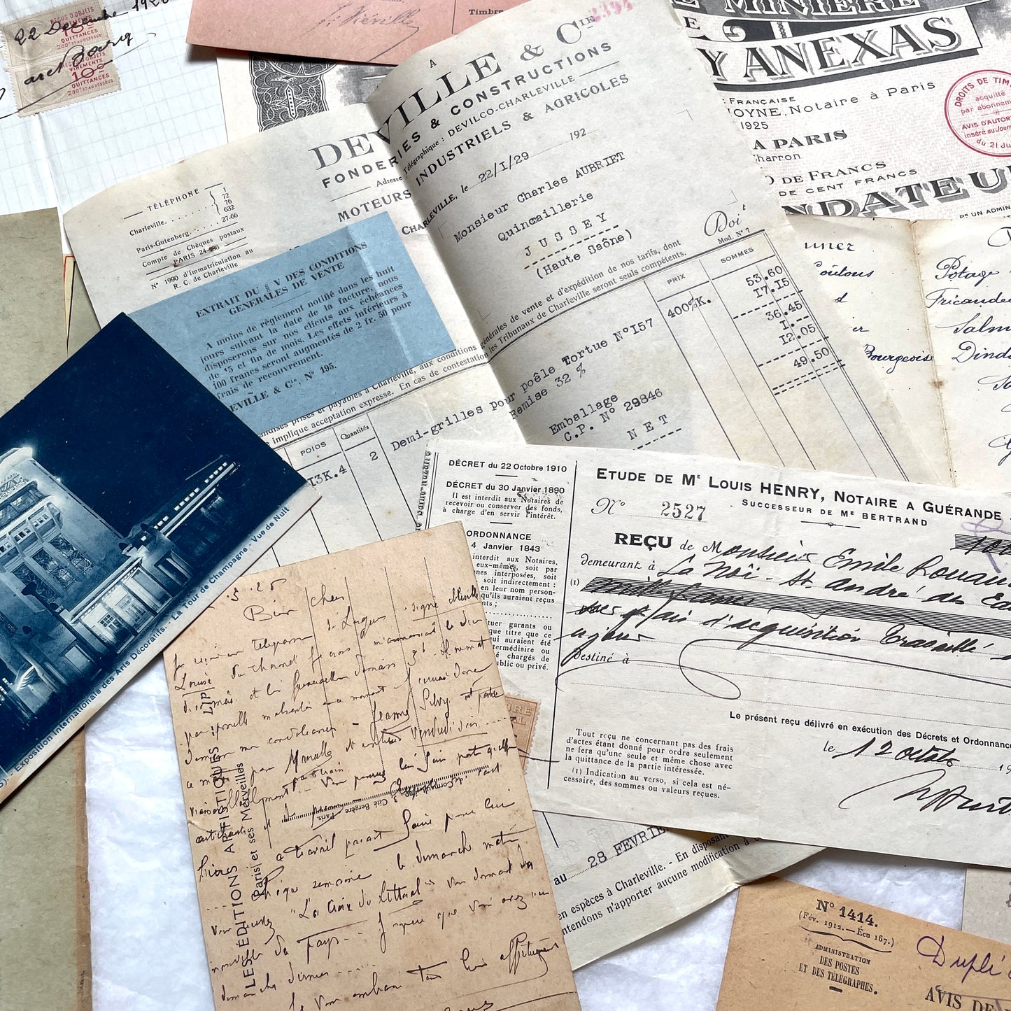 1920s French documents lot with vintage letters, receipts, menu, postcard, and stock certificate, all paper ephemera.