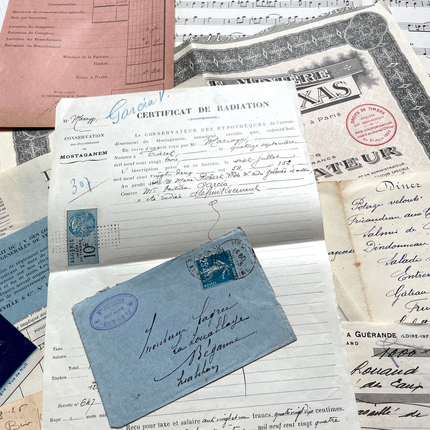 1920s French documents lot with vintage letters, receipts, menu, postcard, and stock certificate, all paper ephemera.