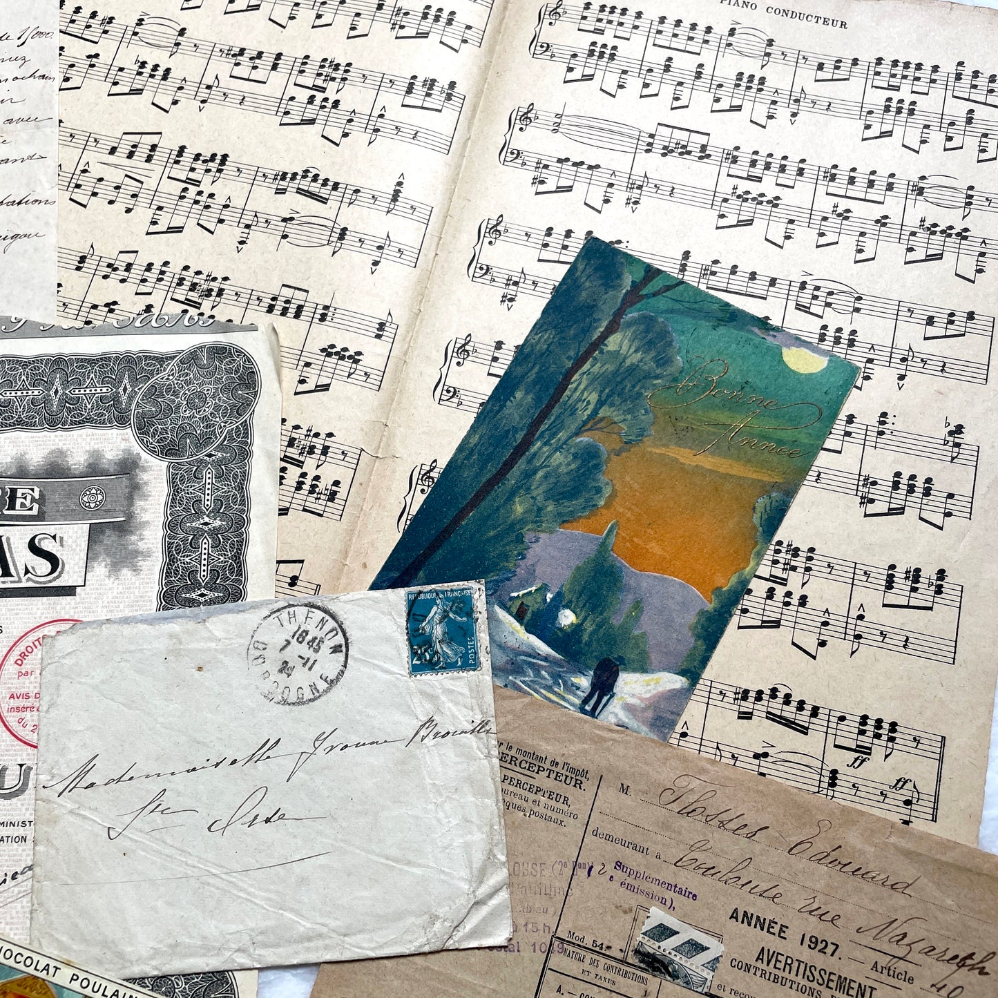 1920s French historical paper ephemera lot with stock certificate, handwritten letters, postcards, and vintage photo.