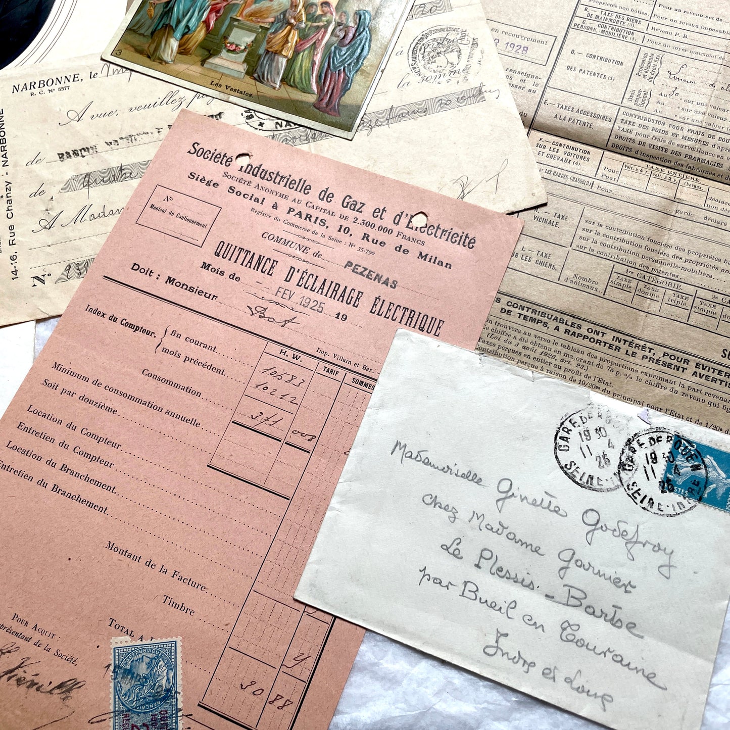1920s French historical paper ephemera lot with stock certificate, handwritten letters, postcards, and vintage photo.