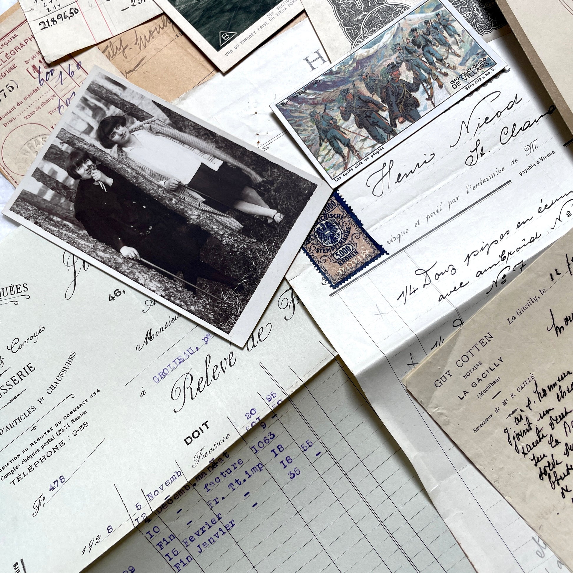 1920s French historical paper ephemera lot with stock certificate, handwritten letters, postcards, and vintage photo.