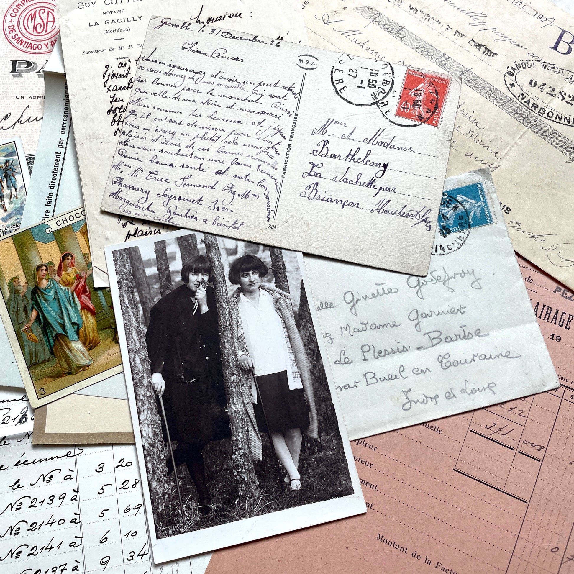 1920s French historical paper ephemera lot with stock certificate, handwritten letters, postcards, and vintage photo.