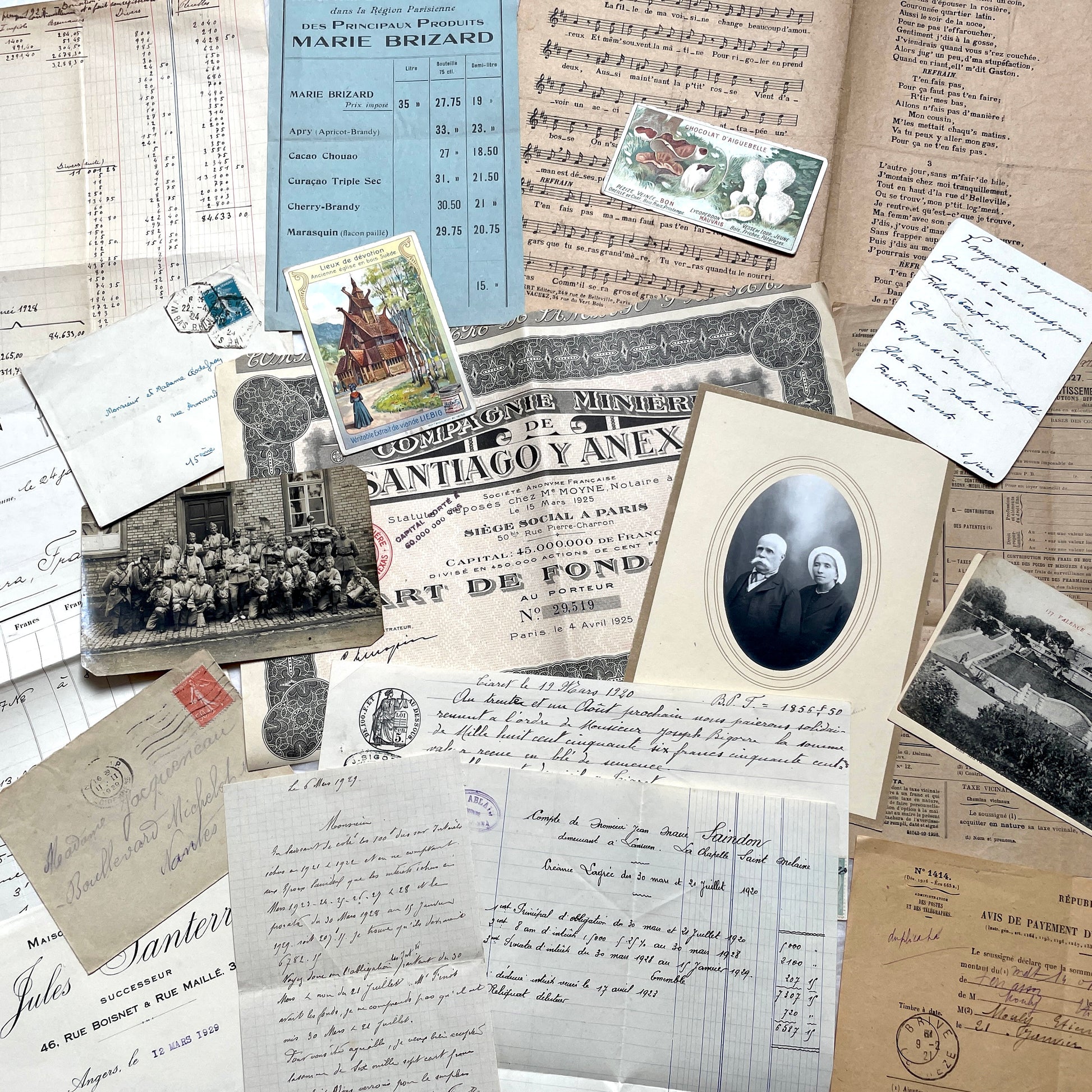 1920s French Documents Lot with a share certificate, handwritten letters, sheet music, and an old photograph.