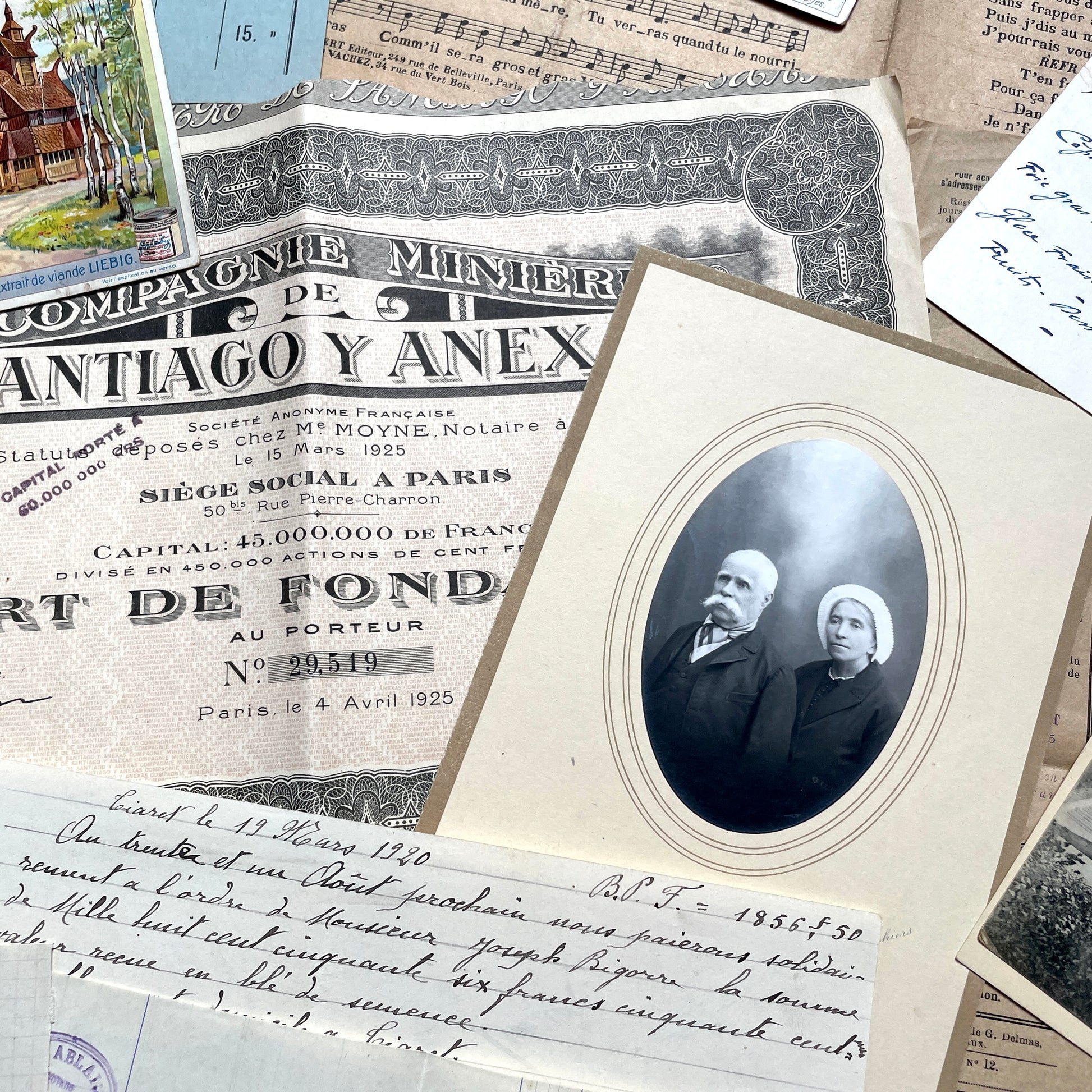 1920s French Documents Lot with a share certificate, handwritten letters, sheet music, and an old photograph.