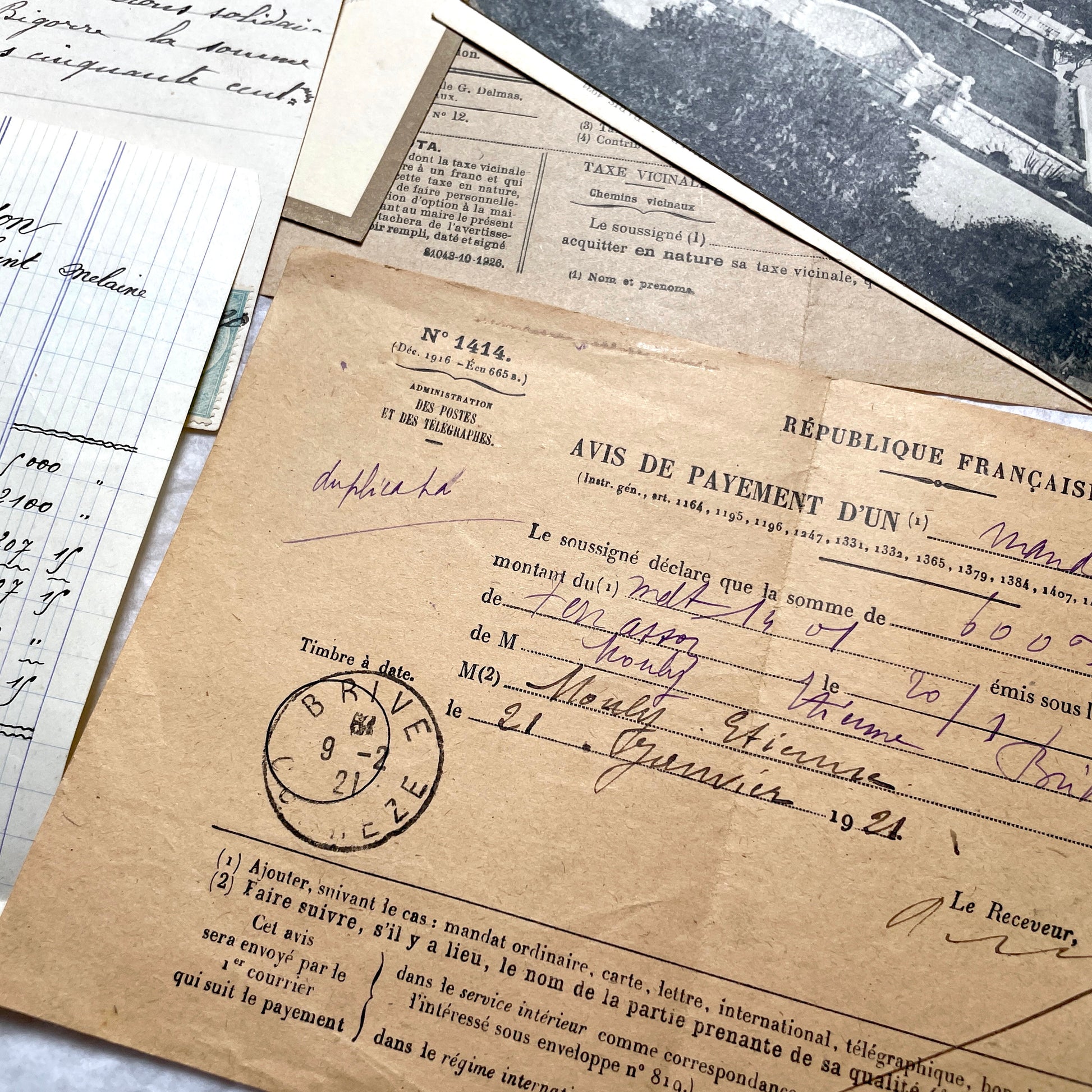 1920s French Documents Lot with a share certificate, handwritten letters, sheet music, and an old photograph.