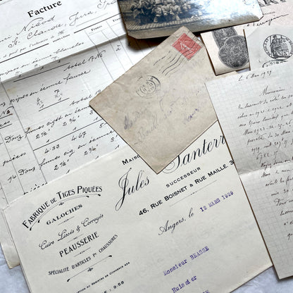 1920s French Documents Lot with a share certificate, handwritten letters, sheet music, and an old photograph.