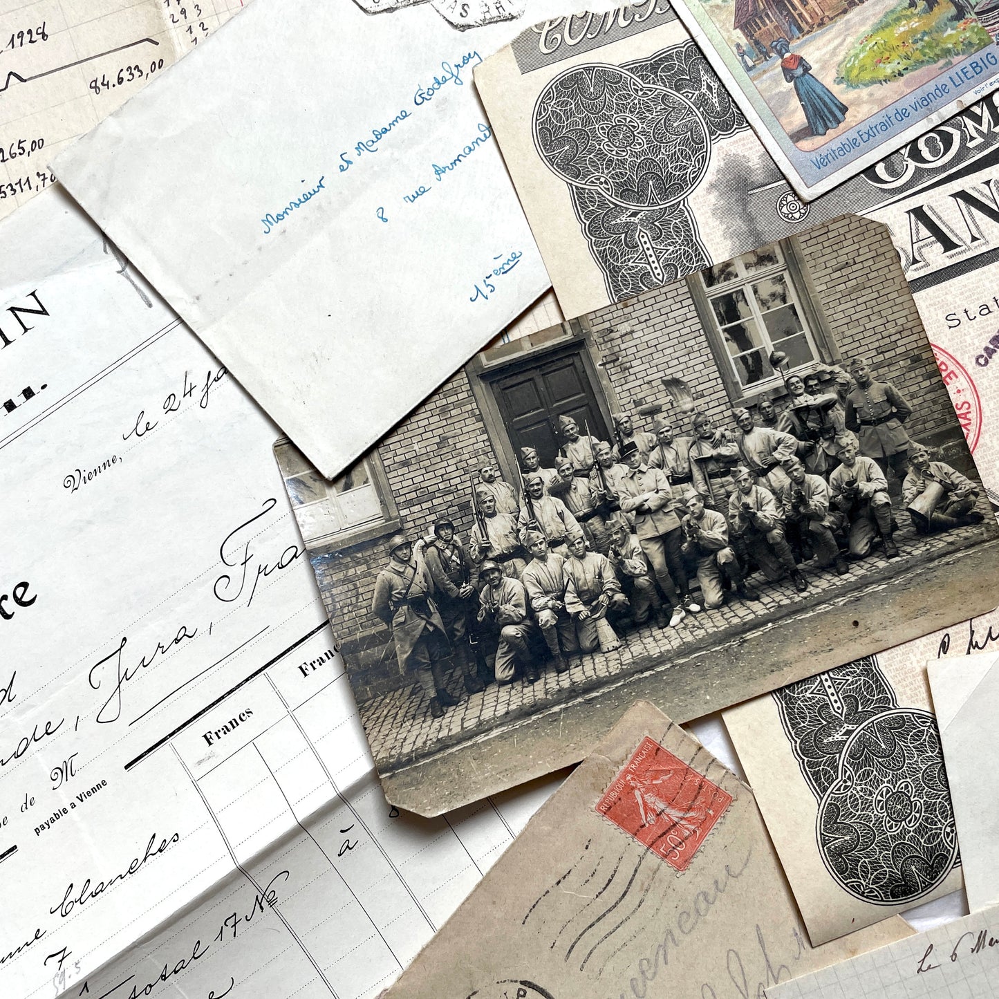 1920s French Documents Lot with a share certificate, handwritten letters, sheet music, and an old photograph.