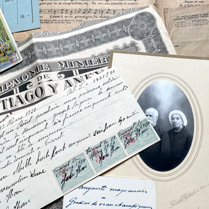 1920s French Documents Lot with a share certificate, handwritten letters, sheet music, and an old photograph.