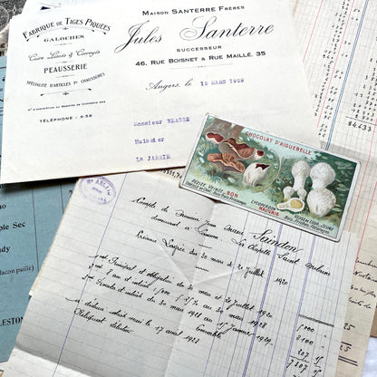 1920s French Documents Lot with a share certificate, handwritten letters, sheet music, and an old photograph.