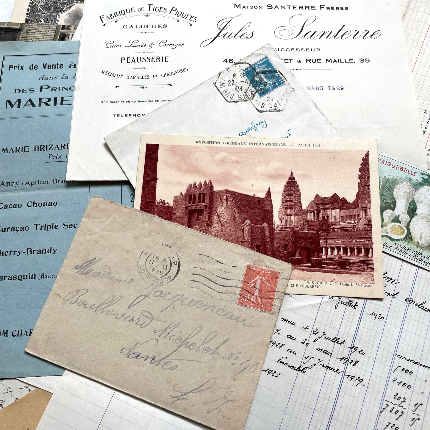 1920s French Documents Lot with a share certificate, handwritten letters, sheet music, and an old photograph.
