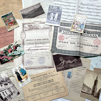 1920s French Ephemera Lot with various documents, vintage postcards, sheet music, period photos, and a stock certificate.