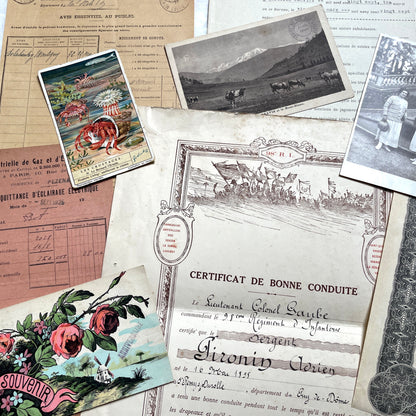 1920s French Ephemera Lot with various documents, vintage postcards, sheet music, period photos, and a stock certificate.