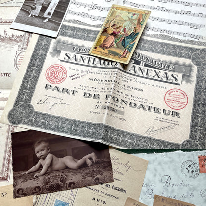 1920s French Ephemera Lot with various documents, vintage postcards, sheet music, period photos, and a stock certificate.